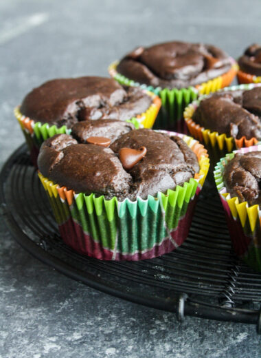 Moist, eggless chocolate banana muffins with peanut butter and no added sugar or fat.