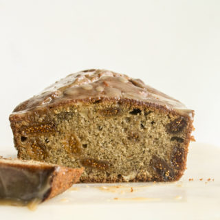 Moist fig and walnut cake with spices and a brown sugar glaze