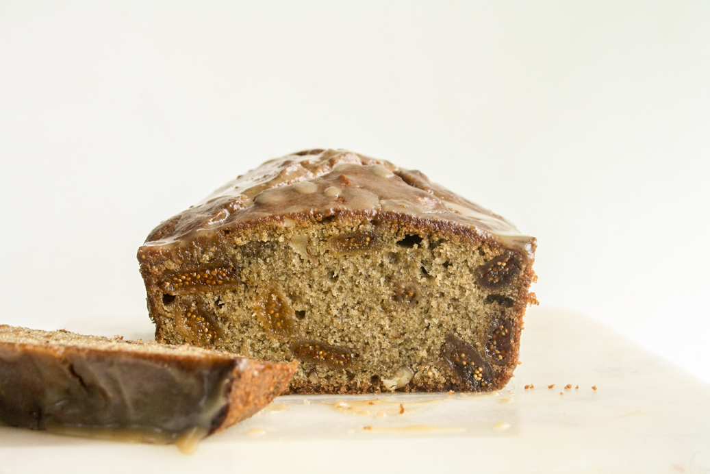 Moist fig and walnut cake with spices and a brown sugar glaze