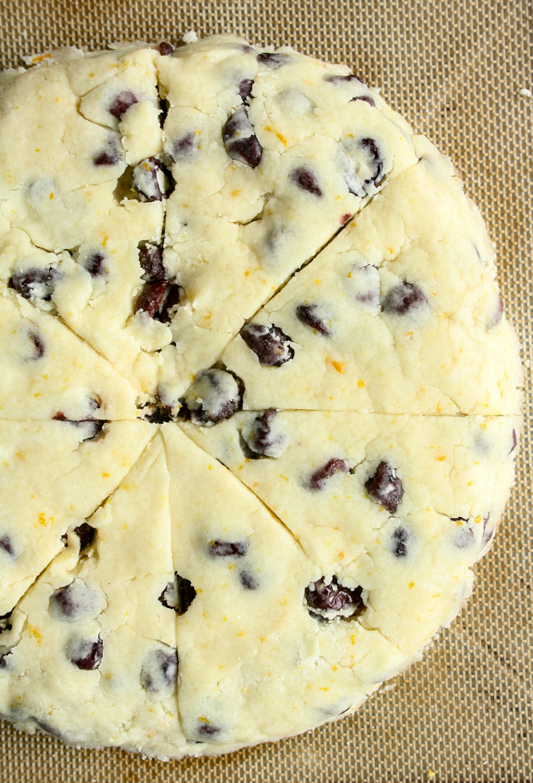 Tender, eggless scones packed with orange zest and cranberries.