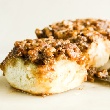 Gooey and sticky cinnamon rolls with a pecan caramel topping