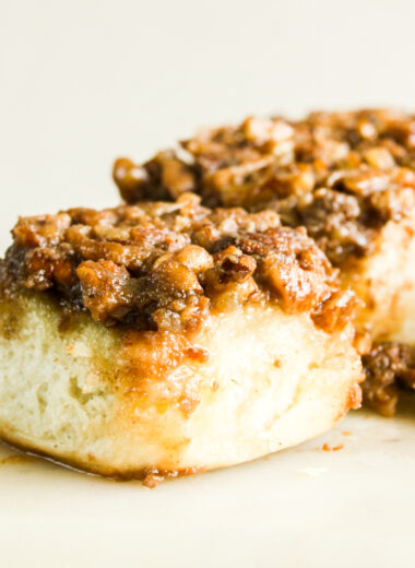 Gooey and sticky cinnamon rolls with a pecan caramel topping