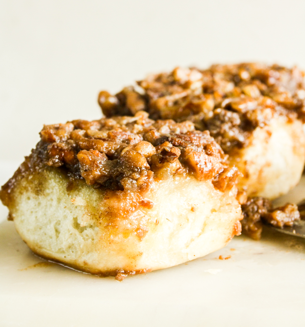 Gooey and sticky cinnamon rolls with a pecan caramel topping