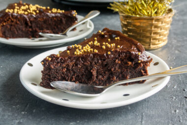 Fudgy, frosted chocolate almond cake with whiskey and orange zest