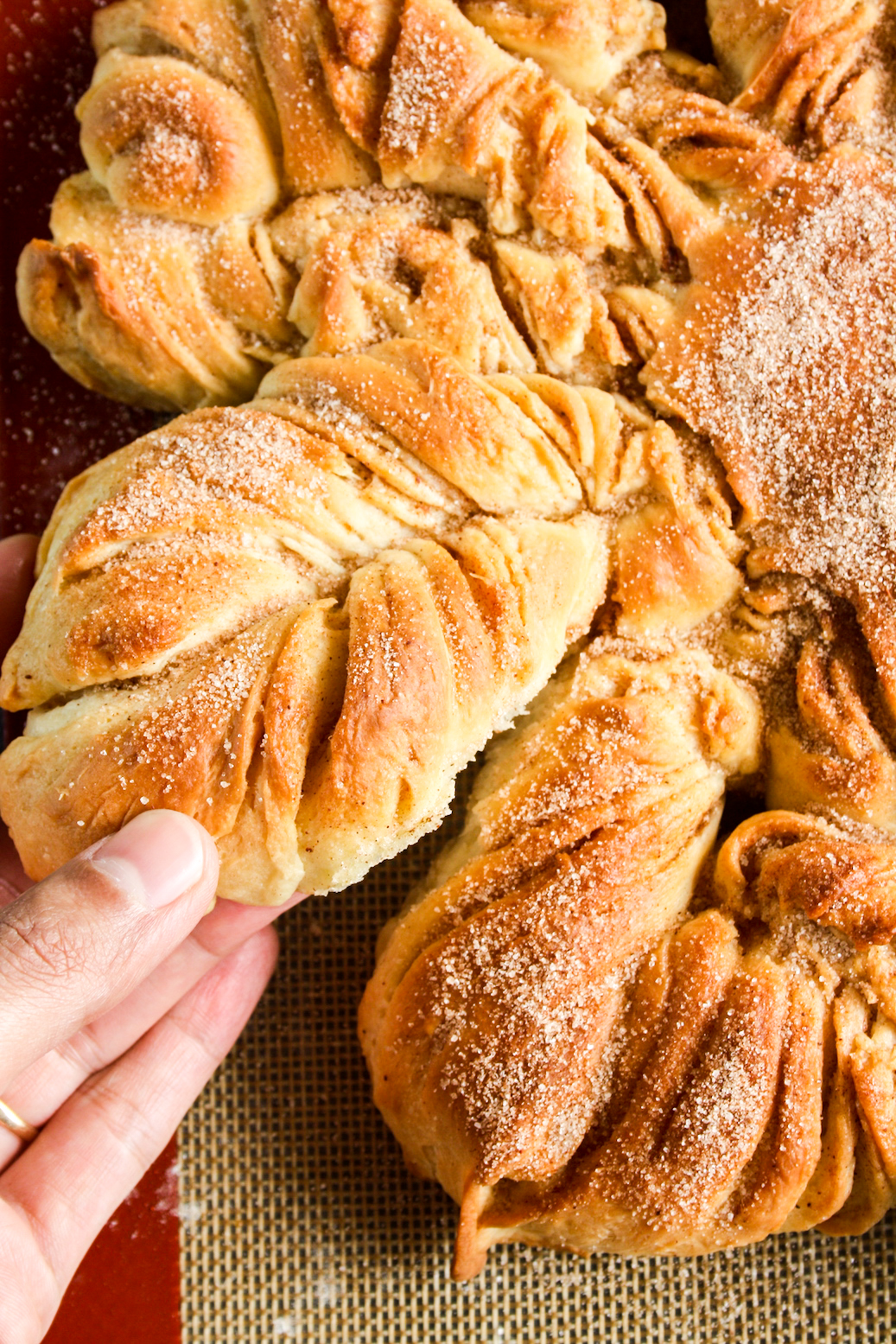 Soft and fluffy star shaped bread with a cinnamon sugar filling
