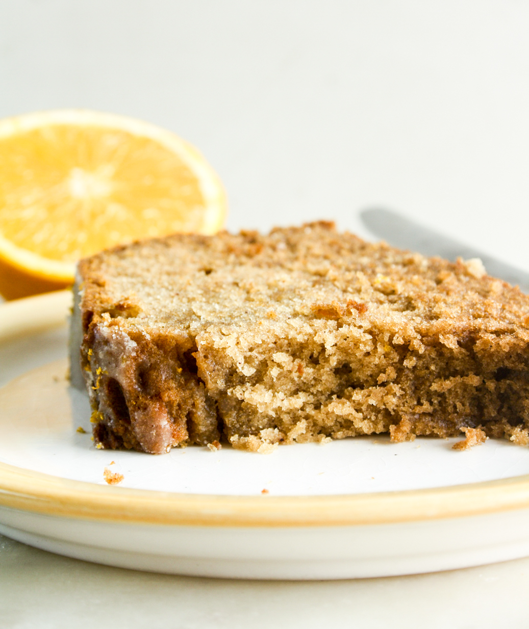 Moist and citrusy spiced ginger cake, with a crackly orange glaze