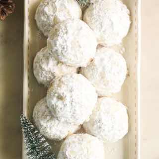 Buttery and crumbly walnut 'snowball' cookies coated in icing sugar