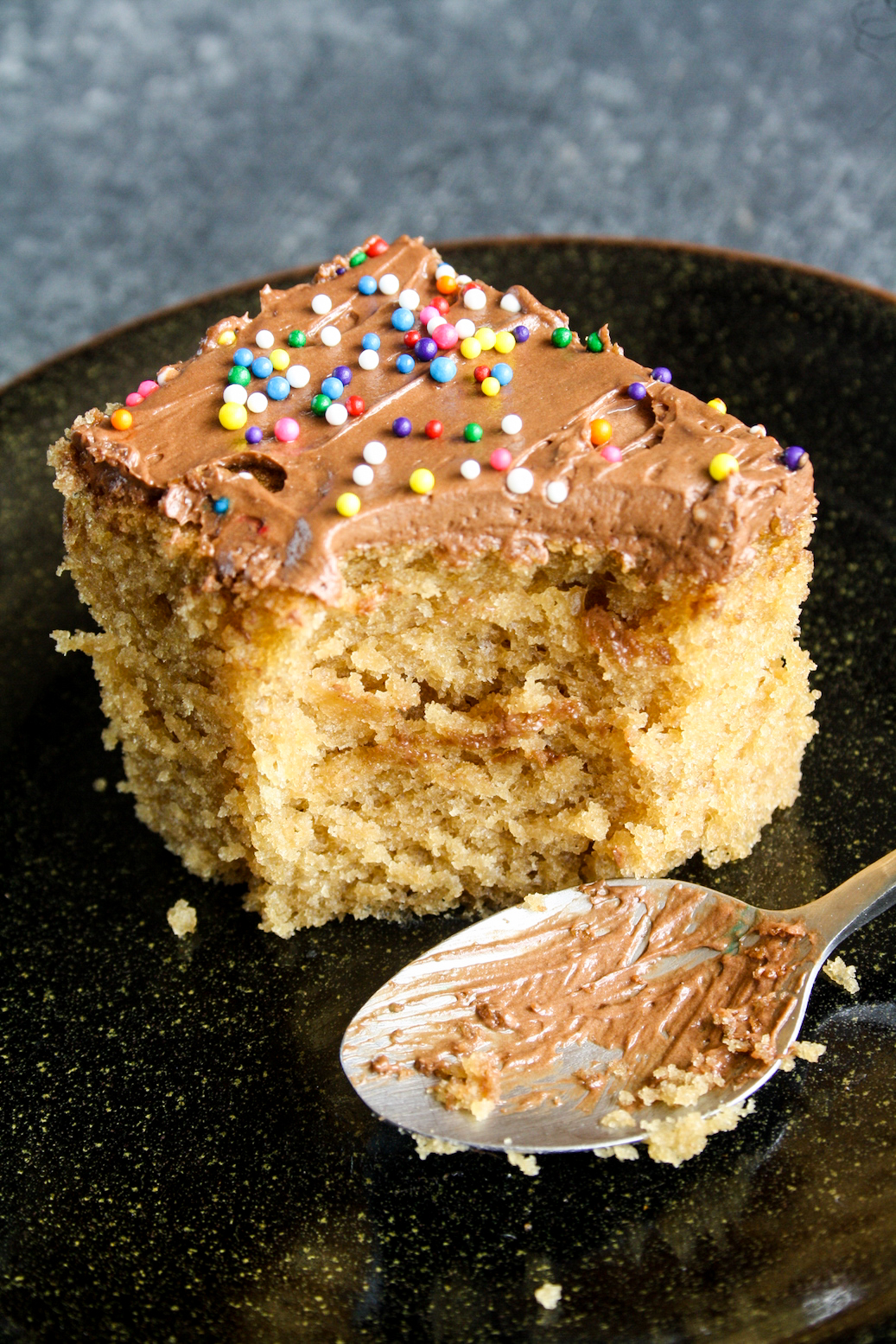 Super moist and easy peanut butter cake frosted with creamy whipped chocolate ganache