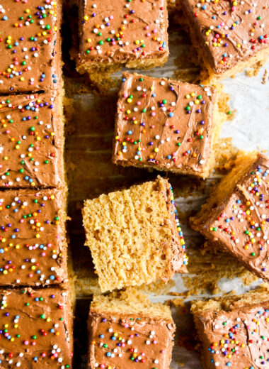 Super moist and easy peanut butter cake frosted with creamy whipped chocolate ganache