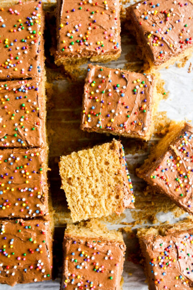 Super moist and easy peanut butter cake frosted with creamy whipped chocolate ganache