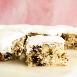 Soft banana cake with walnuts, chocolate chips and cream cheese frosting