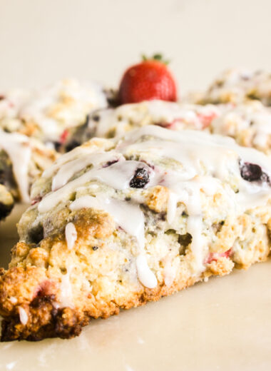 Tender, crumbly berry scones with a tangy lemon glaze