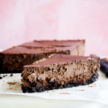 Creamy, baked small-batch chocolate cheesecake on an Oreo crust