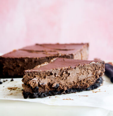 Creamy, baked small-batch chocolate cheesecake on an Oreo crust