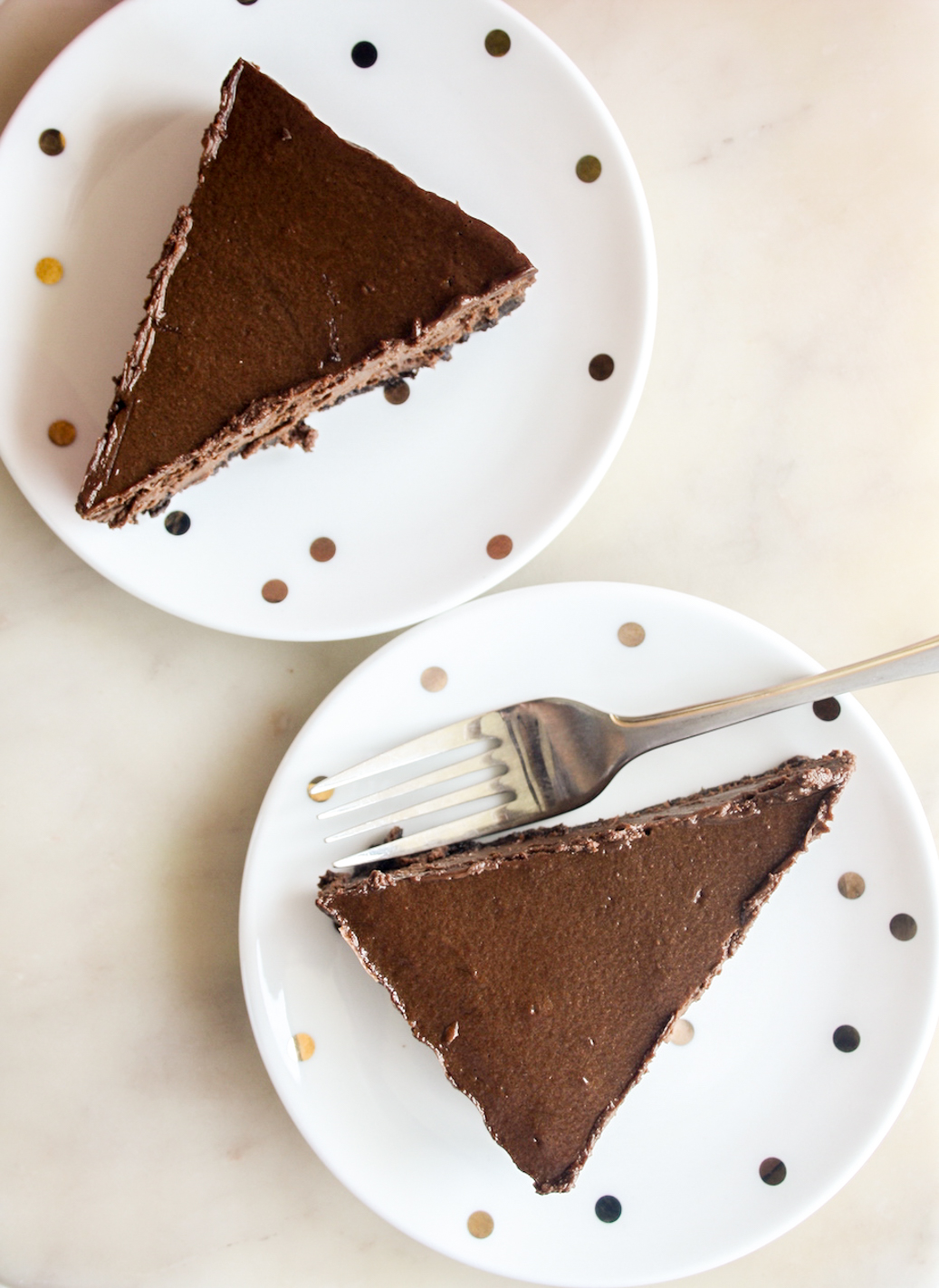 Creamy, baked small-batch chocolate cheesecake on an Oreo crust