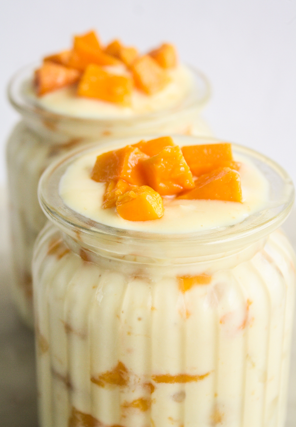 Easy instant custard layered with ladyfinger biscuits, fresh mango and banana