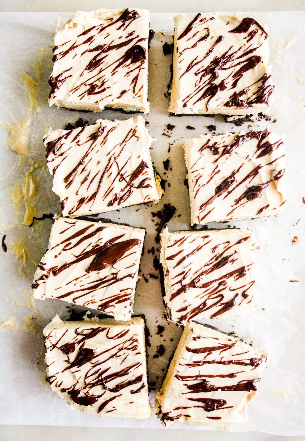 Light and creamy no bake peanut butter cheesecake bars with Oreo Crust
