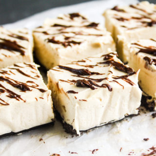 Light and creamy no bake peanut butter cheesecake bars with Oreo Crust