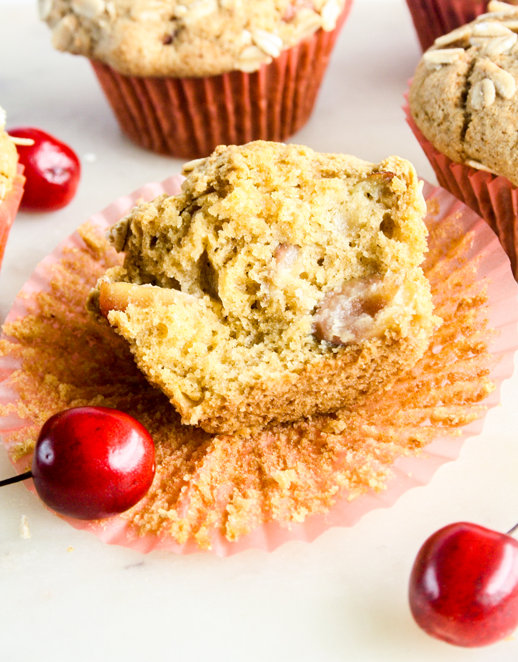Soft and moist cornmeal muffins with fresh cherries