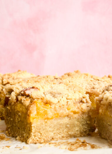 Buttery, soft shortbread bars with peach filling and crumble topping