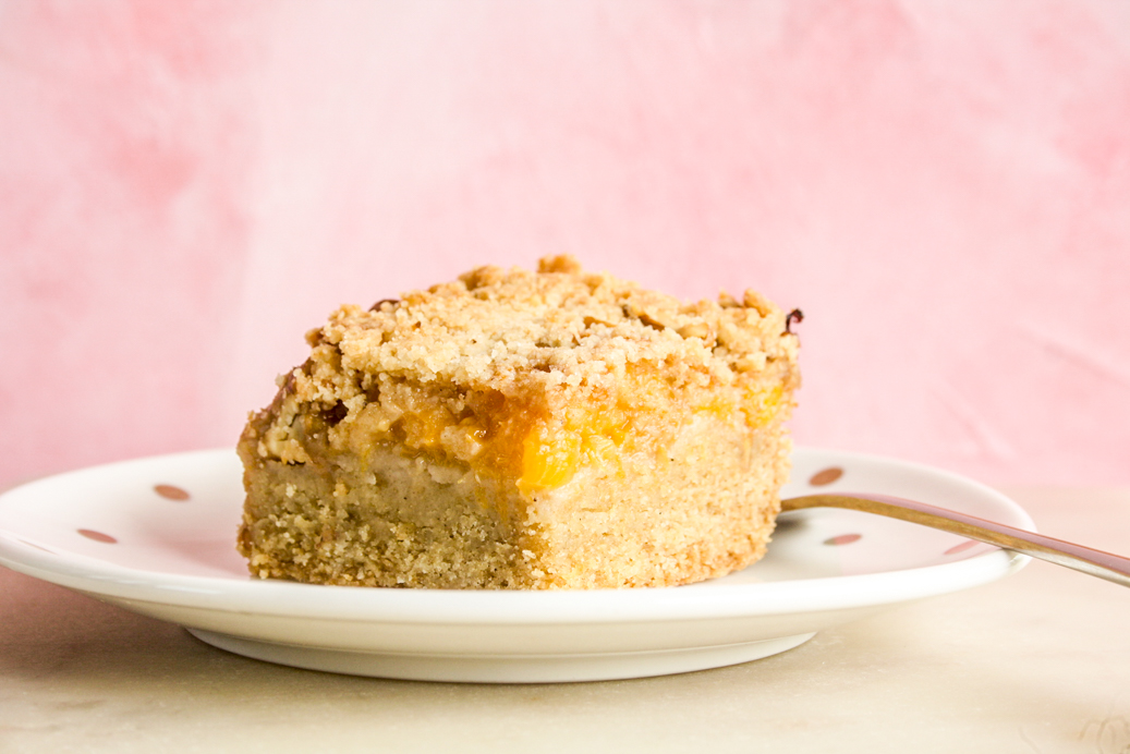 Buttery, soft shortbread bars with peach filling and crumble topping