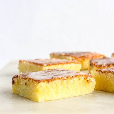 Moist, dense and gooey lemon blondies with lemon glaze