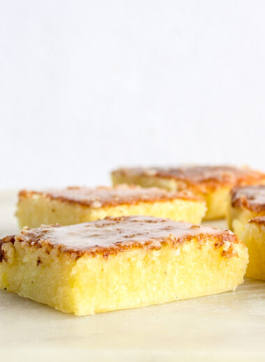 Moist, dense and gooey lemon blondies with lemon glaze