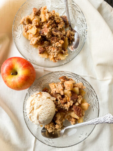 Crunchy, toasty, spiced apple crumble with ginger biscuits and walnuts