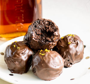 Moist and fudgy cake truffles with rum and orange