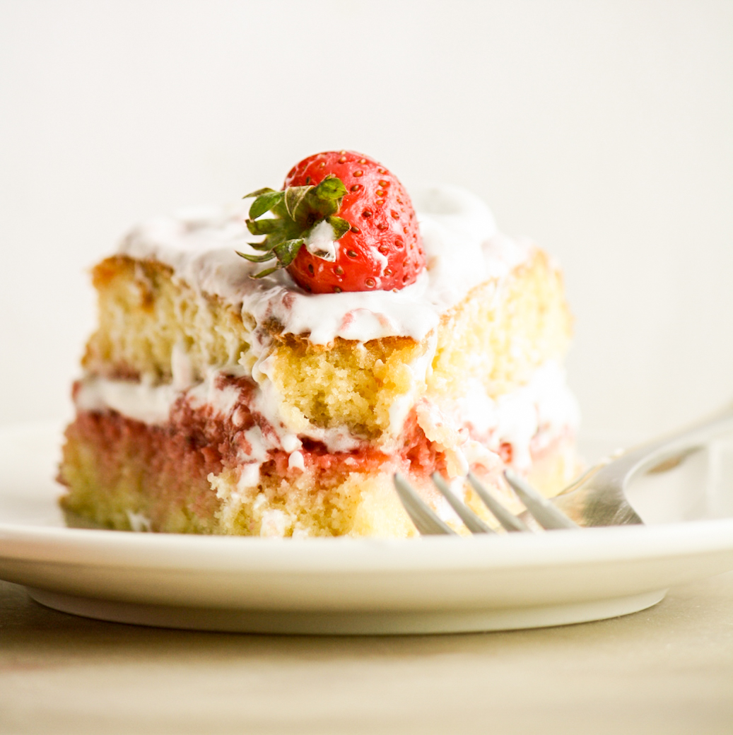 Light and fluffy Genoise sponge with homemade strawberry compote, whipped cream and fresh berries