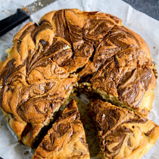 Soft and buttery peanut butter cake with Nutella swirled through it!