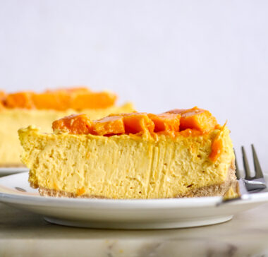 Creamy baked cheesecake with fresh mango and no eggs