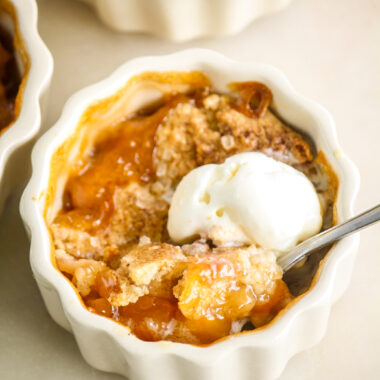 Individual cobblers with jammy peaches and a tender biscuity topping