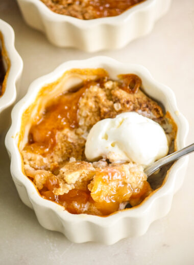 Individual cobblers with jammy peaches and a tender biscuity topping