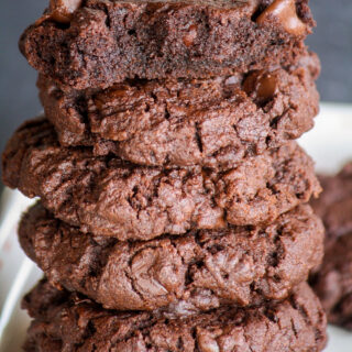 Rich, fudgy triple chocolate cookies with crisp edges and soft centers