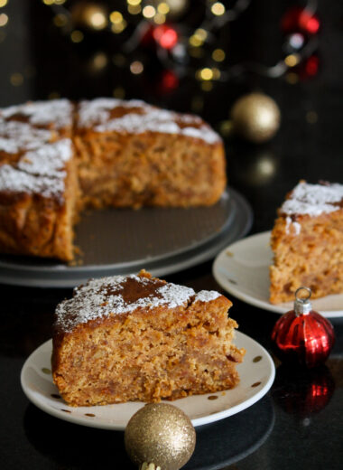 Rich, dense, boozy Christmas cake with dried fruits cooked in beer and rum