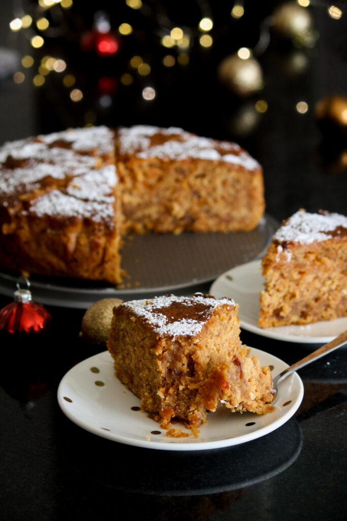 Rich, dense, boozy Christmas cake with dried fruits cooked in beer and rum