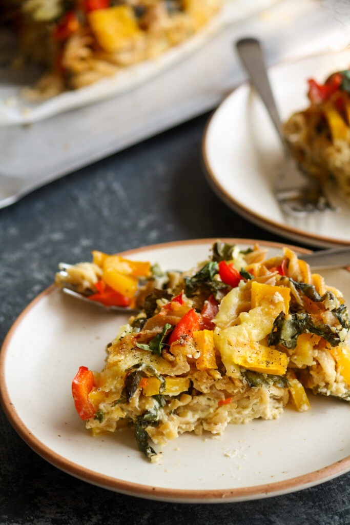Baked pasta with an instant cheese sauce and pumpkin, spinach, mushrooms and bell peppers