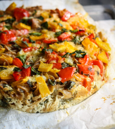 Baked pasta with an instant cheese sauce and pumpkin, spinach, mushrooms and bell peppers
