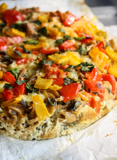 Baked pasta with an instant cheese sauce and pumpkin, spinach, mushrooms and bell peppers