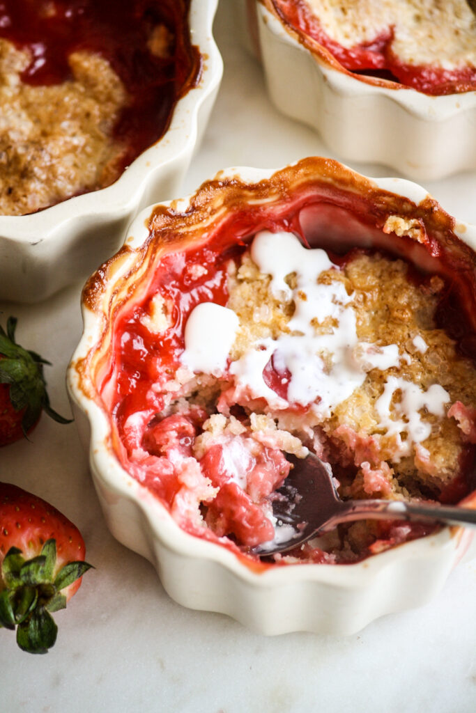 Individual cobblers with jammy strawberries and a tender biscuity topping