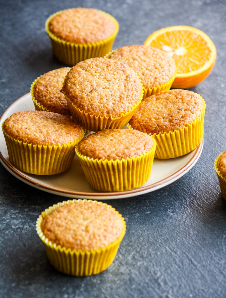Soft and citrusy muffins with fresh orange, olive oil and ground almonds