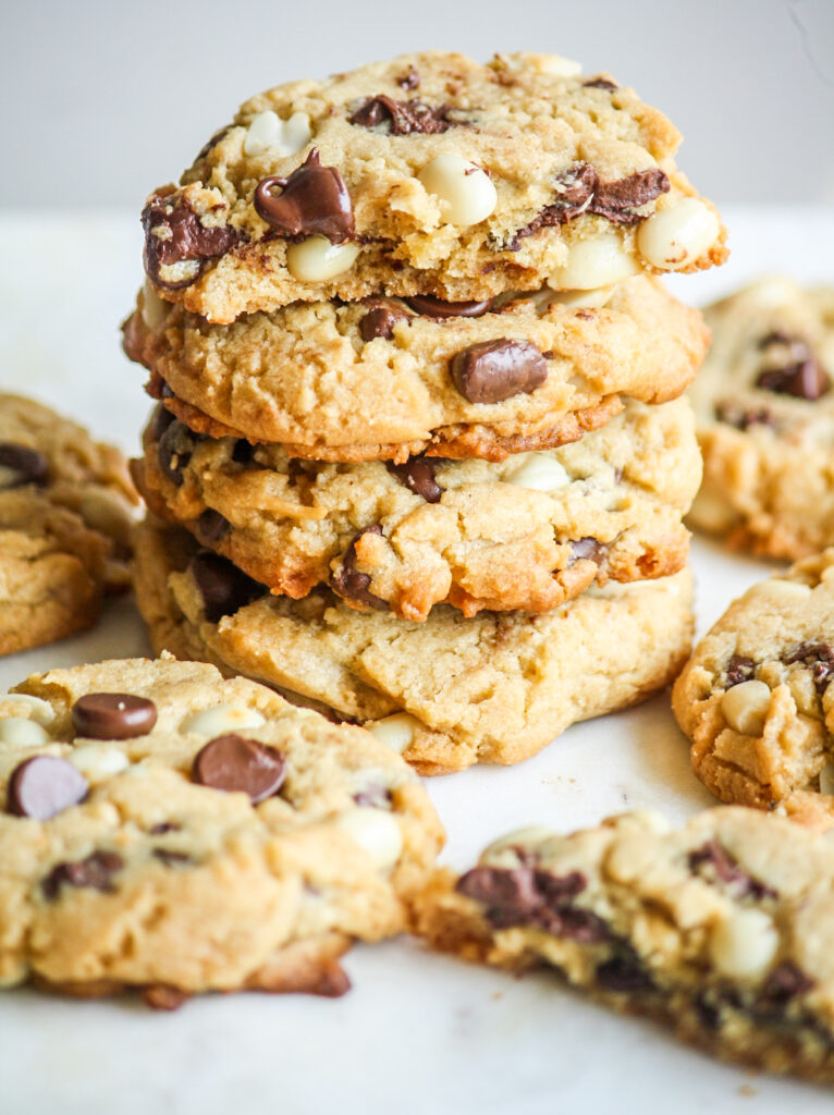 Peanut butter cookies with chocolate chips, roasted peanuts, crispy edges and chewy centers!
