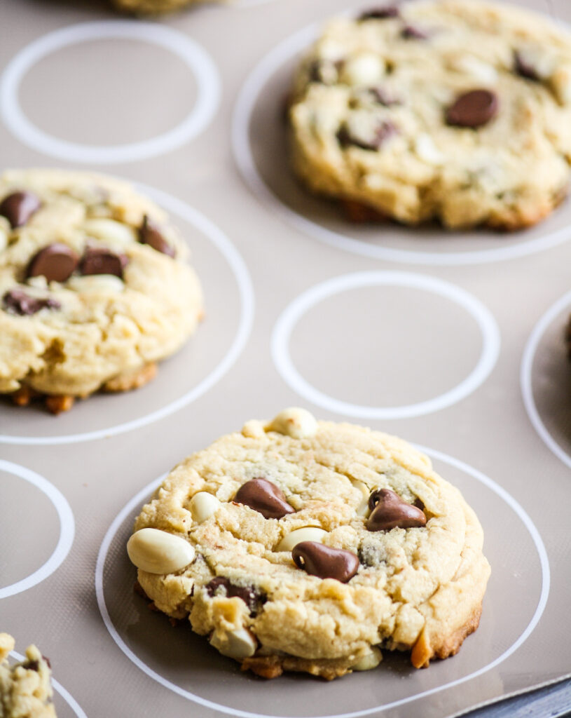 Peanut butter cookies with chocolate chips, roasted peanuts, crispy edges and chewy centers!
