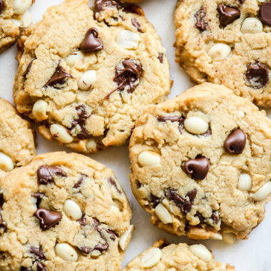 Peanut butter cookies with chocolate chips, roasted peanuts, crispy edges and chewy centers!