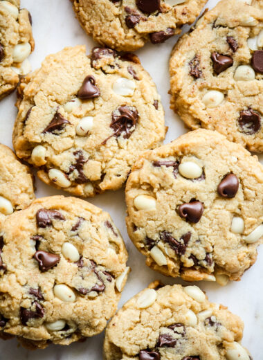 Peanut butter cookies with chocolate chips, roasted peanuts, crispy edges and chewy centers!