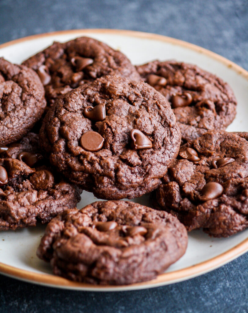 Brownie-like eggless triple chocolate cookies with melted chocolate, cocoa and chocolate chips!
