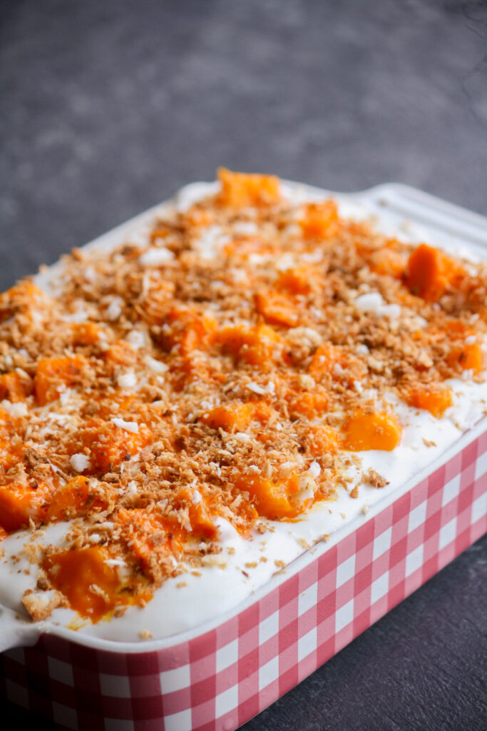 Moist tres leches cake with coconut milk, topped with fresh mangoes and toasted coconut!
