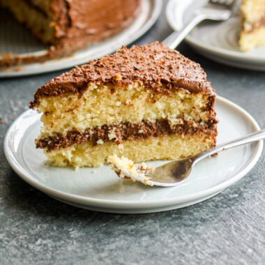 Classic butter cake layered with a rich dark chocolate frosting!