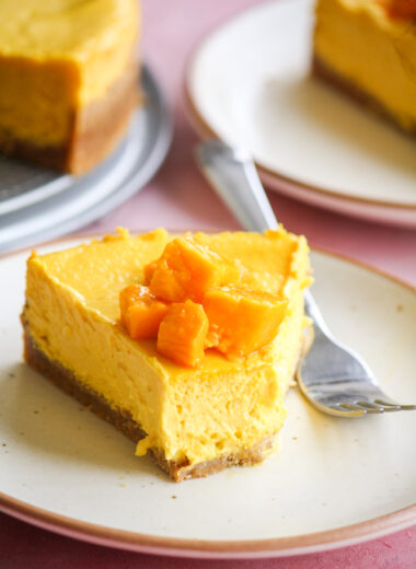 Rich, smooth, creamy baked cheesecake with fresh mango puree!